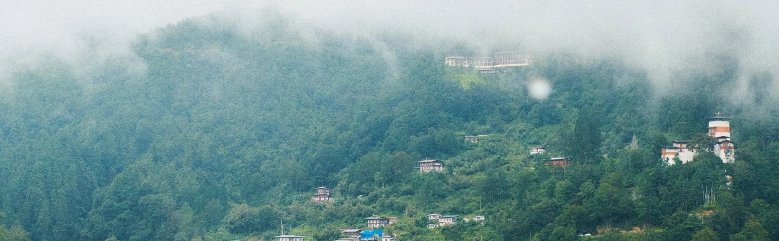Forested mountain settlement near Trongsa and Zhemgang