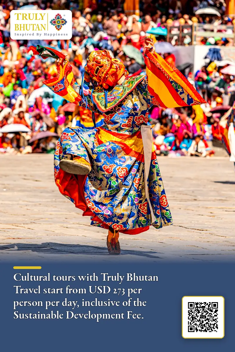 Masked cham dancers performing at Thimphu Tshechu inside Tashichho Dzong courtyard, festival tour by Truly Bhutan Travel